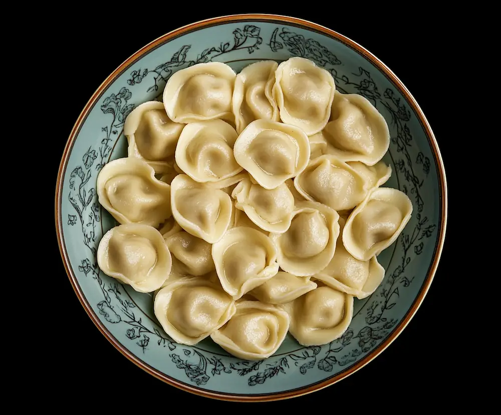 Russian ravioli on a blue plate